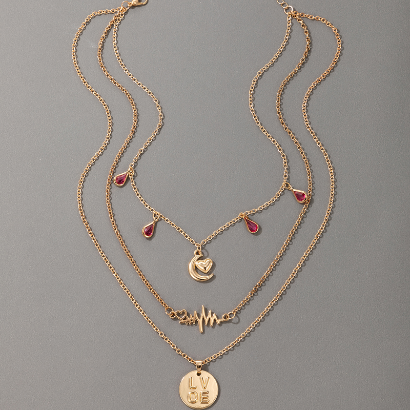 Rhinestone Tassel Moon Peach Heart Letter Pendant Three-layer Necklace display picture 5