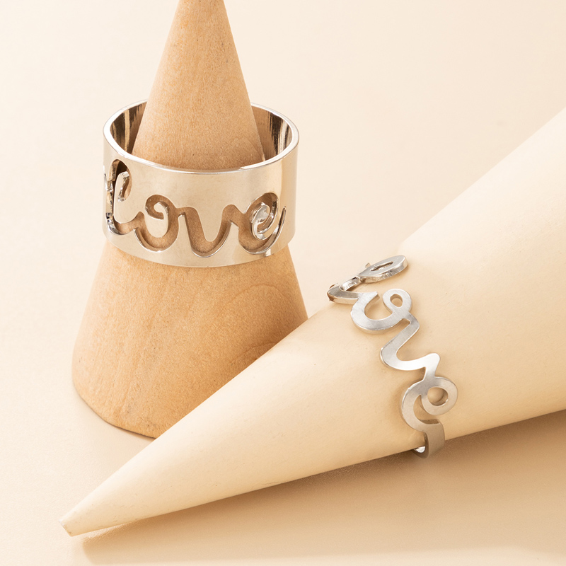 Wholesale Fashion Letter Love Hollow Stitching Couple Ring 2-piece Set Nihaojewelry display picture 3