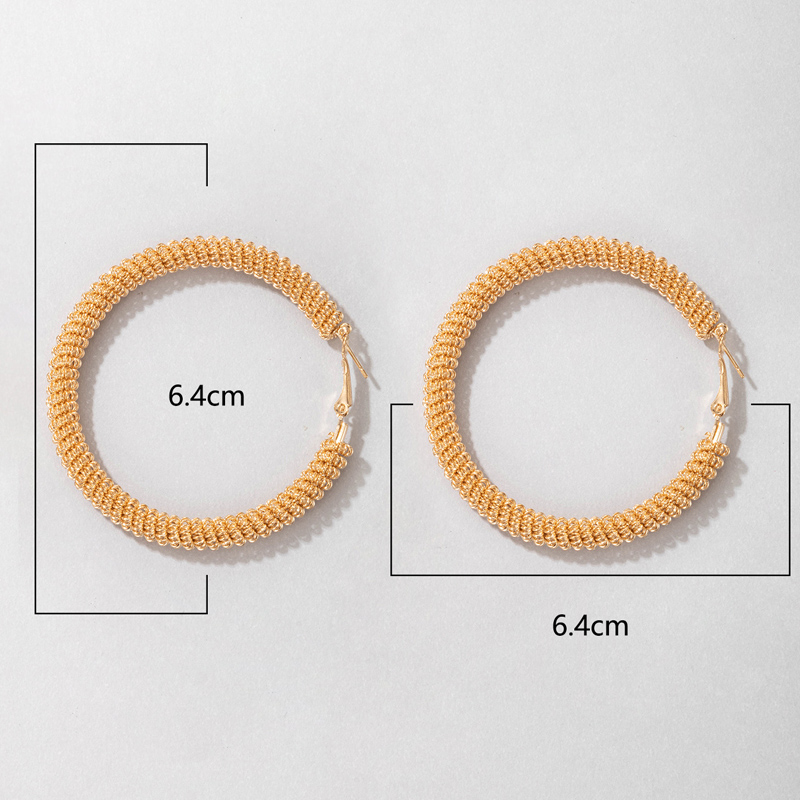 Wholesale Jewelry Retro Golden Winding Circle C-shaped Earrings Nihaojewelry display picture 3