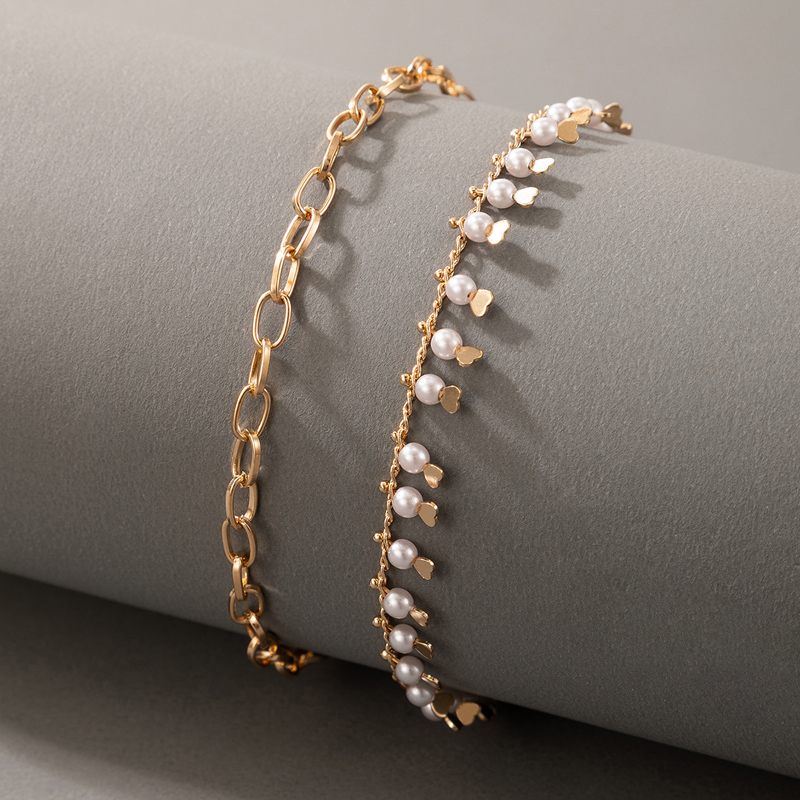 Wholesale New Fashion Metal Heart-shaped Pearl Bracelet 2-piece Set Nihaojewelry display picture 1