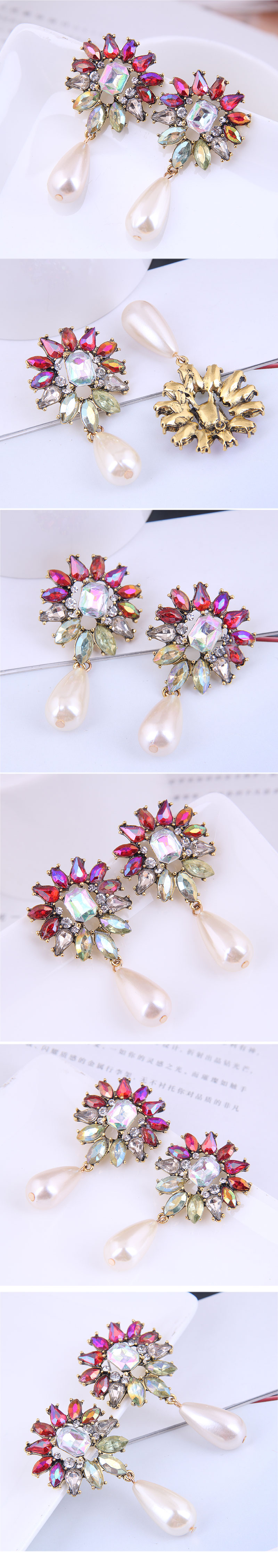 Fashion Metal Bright Water Drop Pearl Earrings Wholesale Nihaojewelry display picture 1