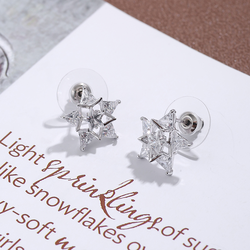 Wholesale Fashion Zircon Inlaid Five-pointed Star Copper Stud Earrings Nihaojewelry display picture 1