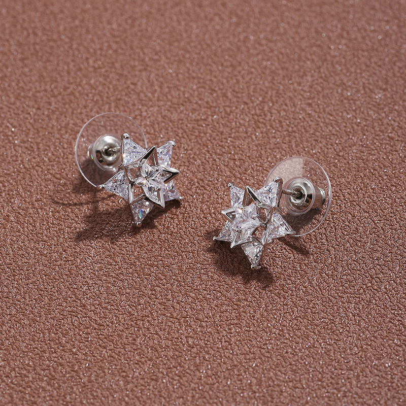 Wholesale Fashion Zircon Inlaid Five-pointed Star Copper Stud Earrings Nihaojewelry display picture 2