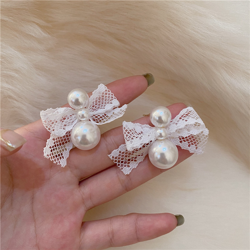 Lace Bowknot Pearl Splicing Stud Earrings Wholesale Nihaojewelry display picture 7