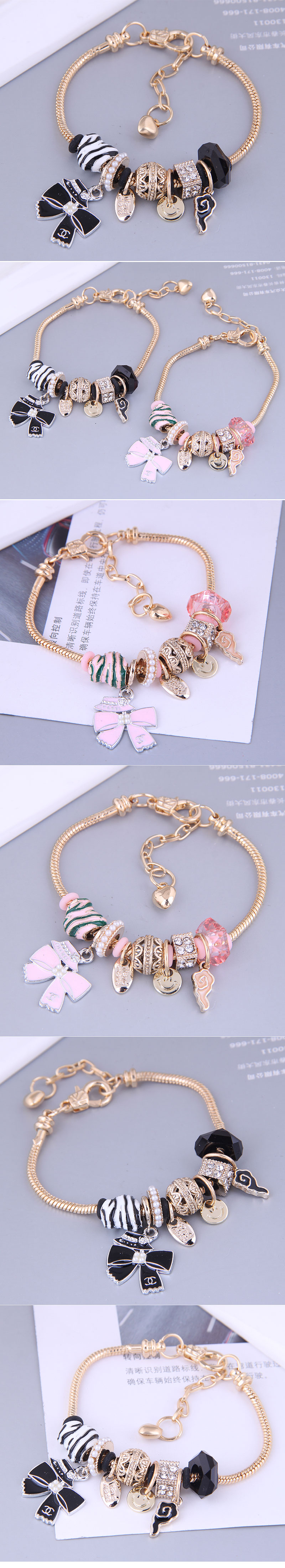 Fashion Gold Metal Simple Bow Multi-element Pendant Bracelet display picture 1