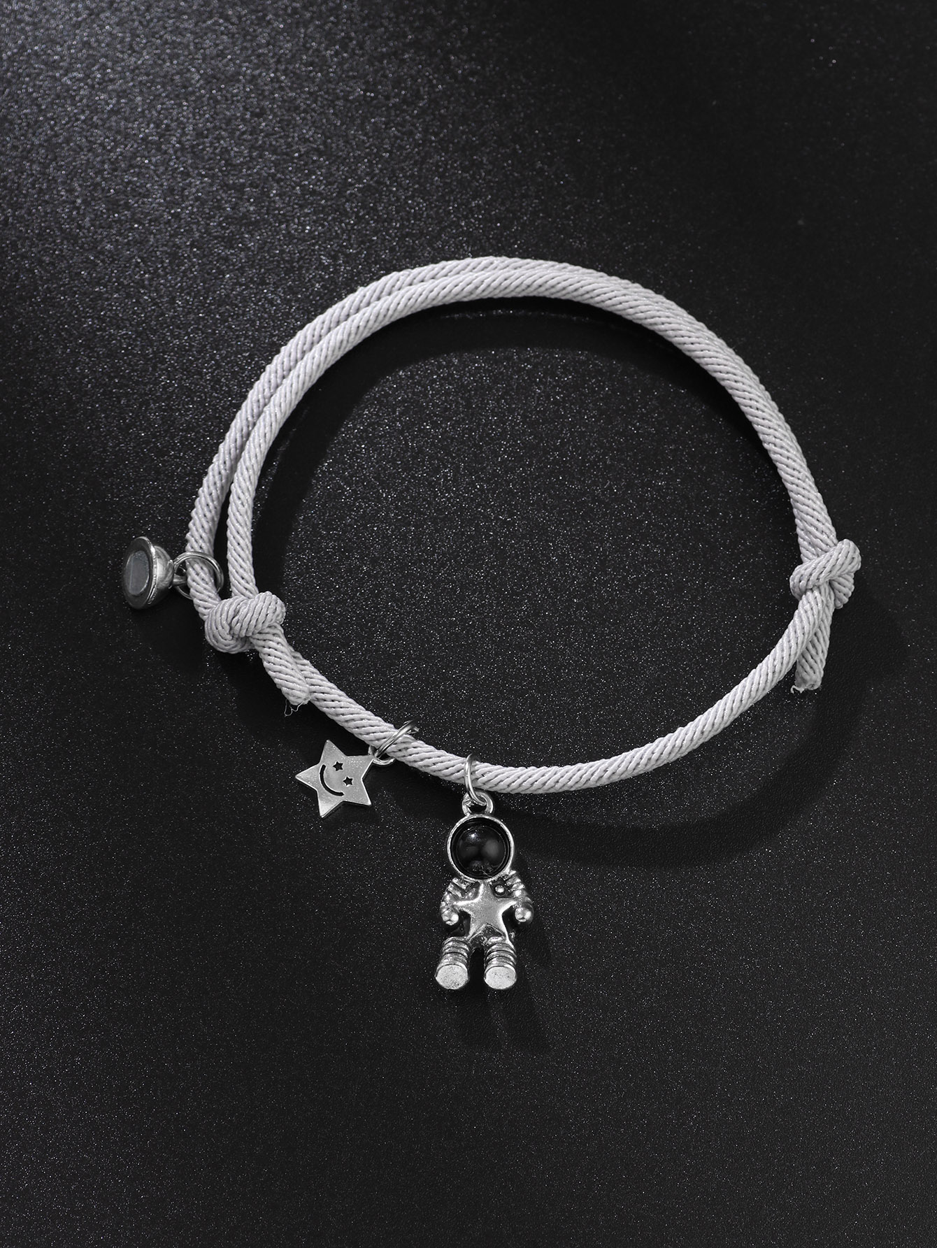 Korean Fashion Star Picking Astronaut Bracelet Couple Suction Stone A Pair Of Jewelry display picture 1