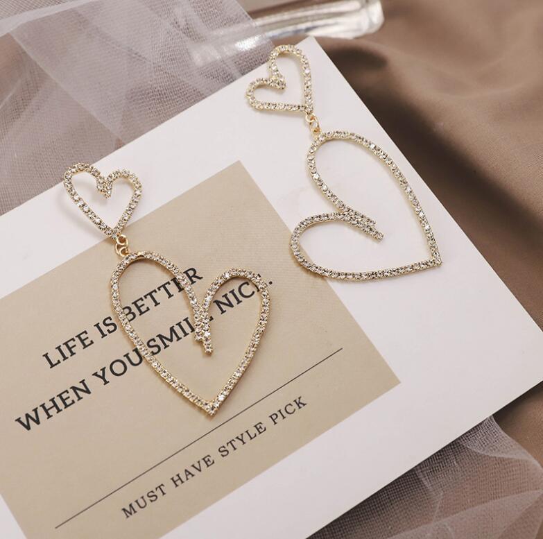 Simple Geometric Exaggerated Double Heart Metal Earrings display picture 3