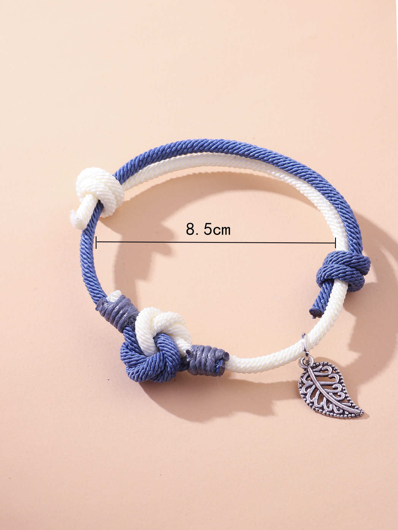 Retro Knot Braided Hand Rope Hollow Leaves Simple Contrast Color Bracelet display picture 3