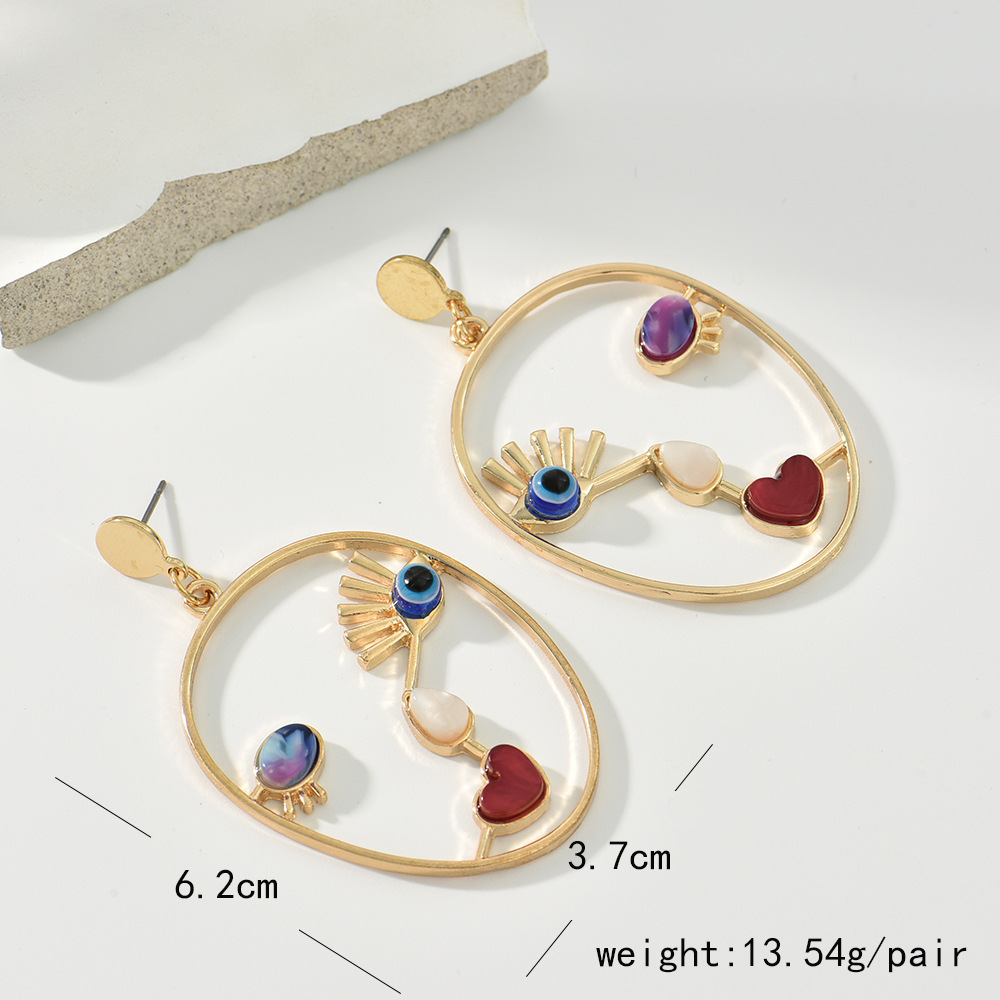 Fashion Human Face Alloy Enamel Plating Hollow Out Women's Drop Earrings 1 Pair display picture 1