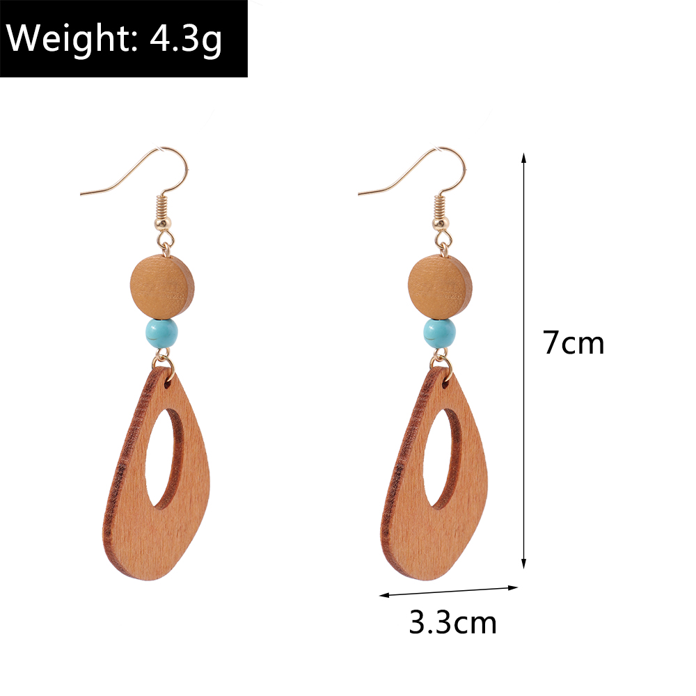 Retro Round Cattle Leopard Alloy Wood Inlay Turquoise Women's Drop Earrings 1 Pair display picture 4