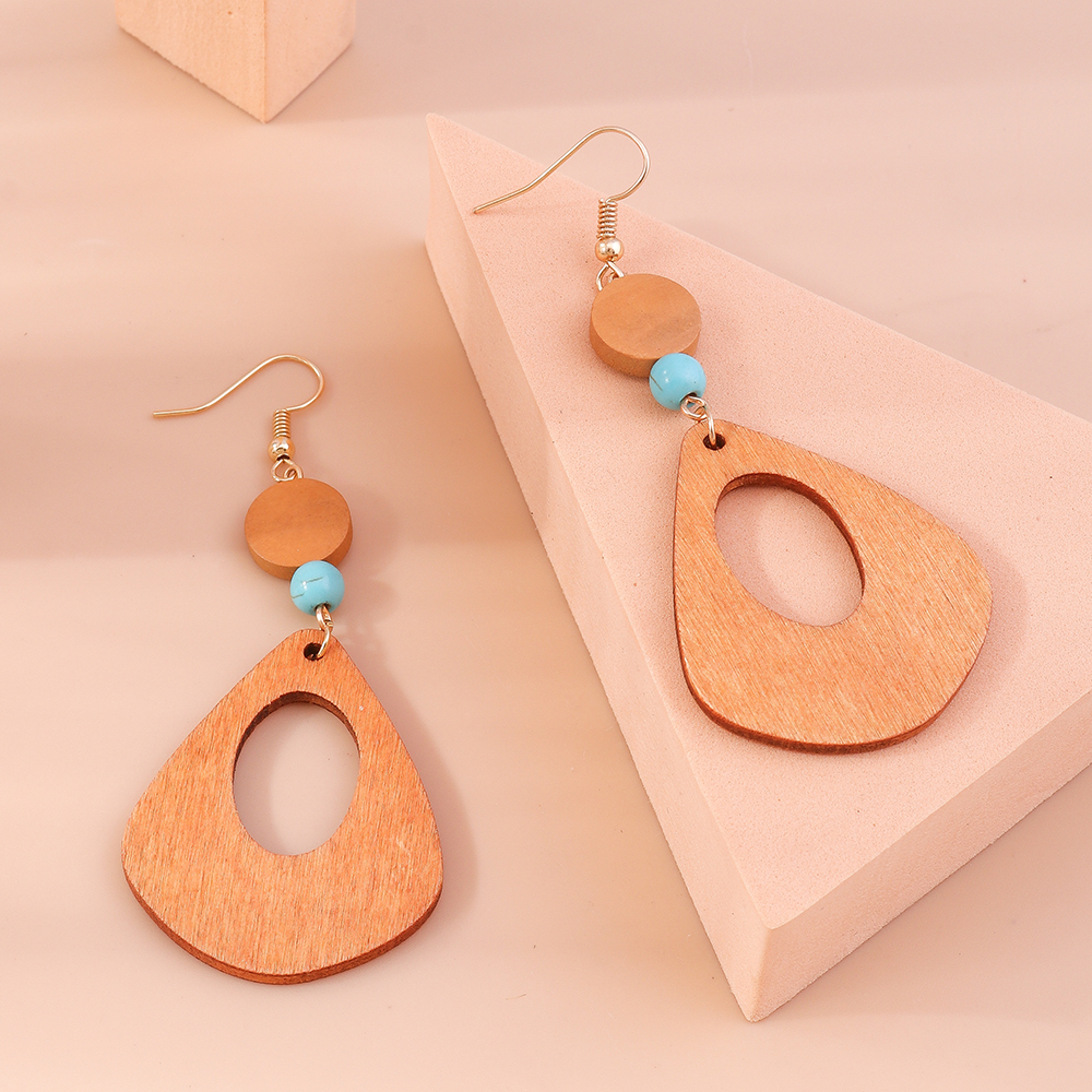 Retro Round Cattle Leopard Alloy Wood Inlay Turquoise Women's Drop Earrings 1 Pair display picture 5