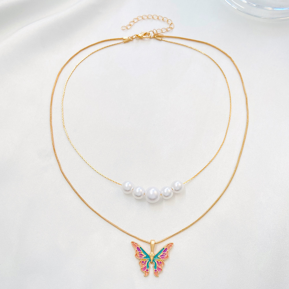 Fashion Butterfly Alloy Enamel Plating Artificial Pearls Women's Layered Necklaces 1 Piece display picture 4
