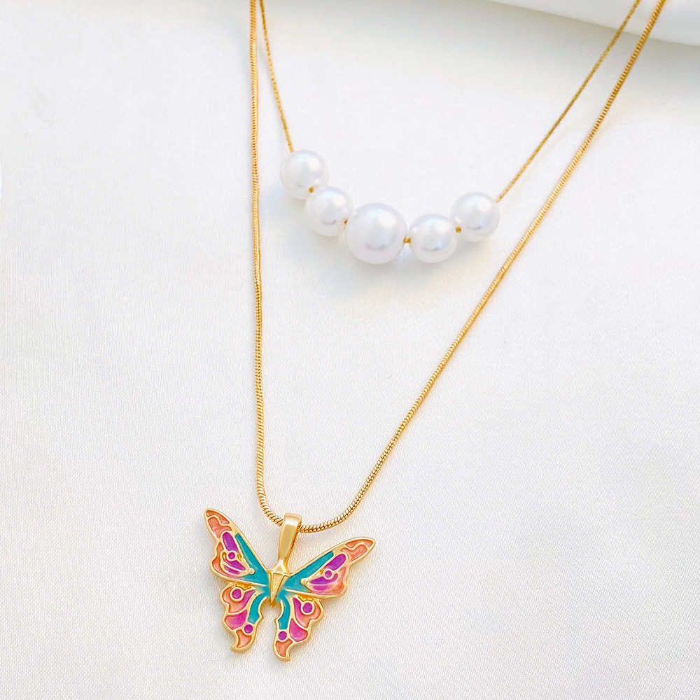 Fashion Butterfly Alloy Enamel Plating Artificial Pearls Women's Layered Necklaces 1 Piece display picture 5