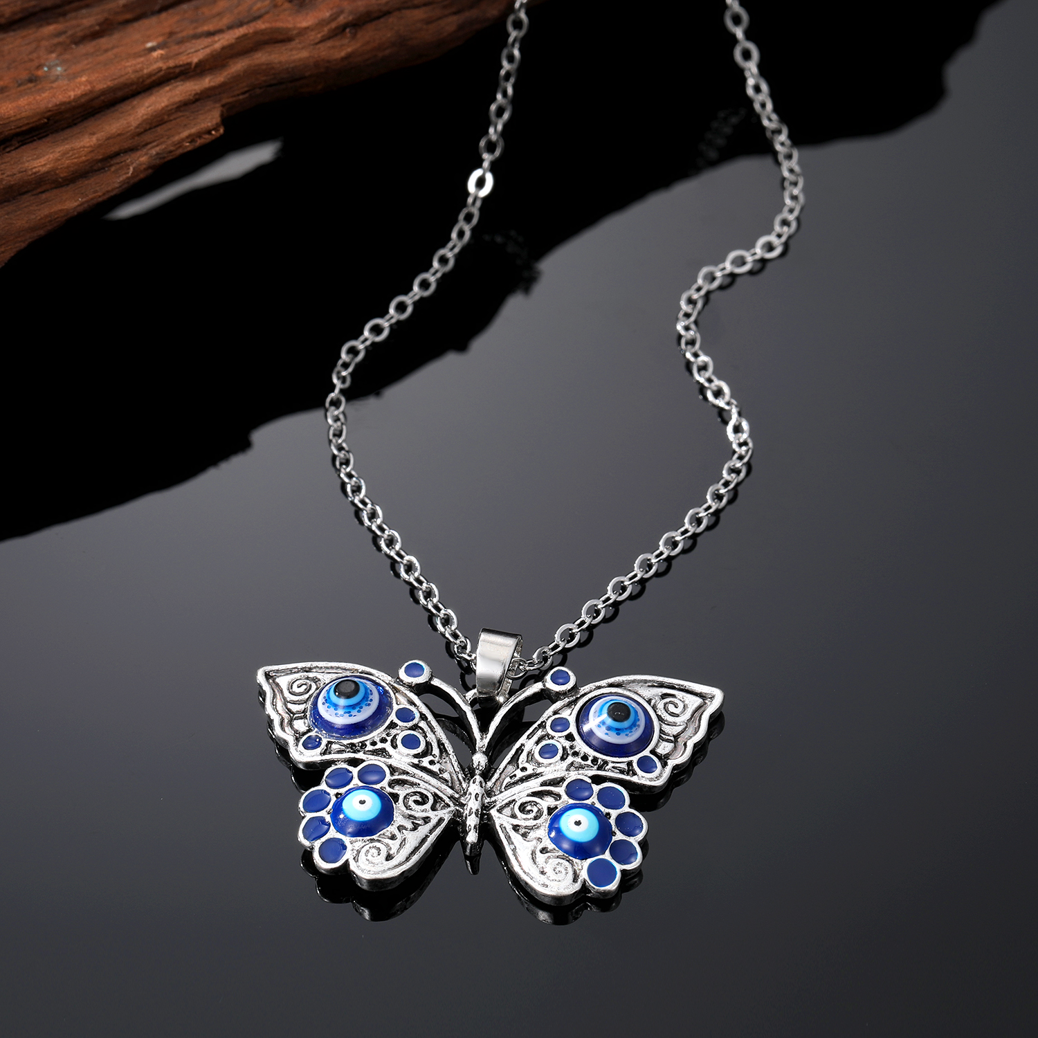 Retro Devil's Eye Butterfly Alloy Women's Earrings Keychain Necklace display picture 2