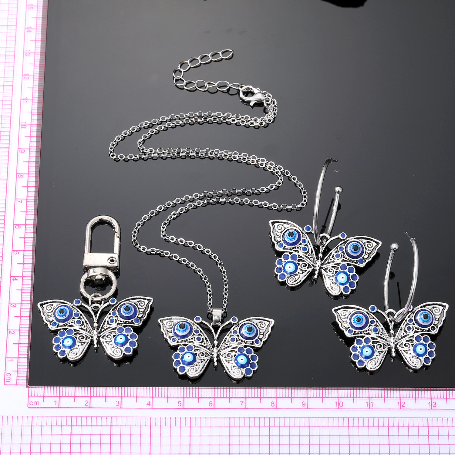 Retro Devil's Eye Butterfly Alloy Women's Earrings Keychain Necklace display picture 4