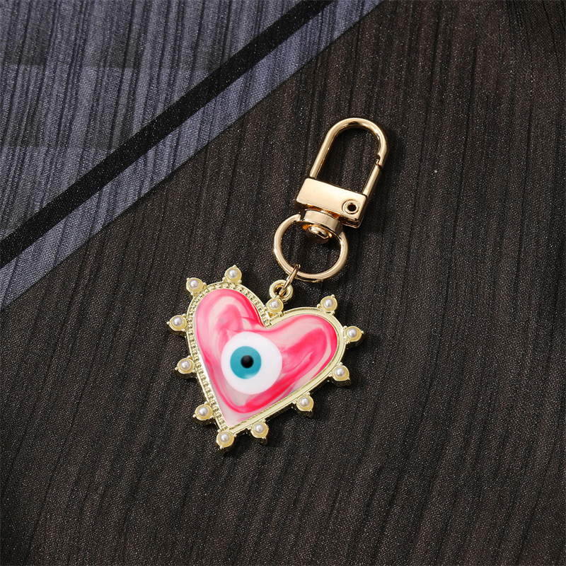 Fashion Devil's Eye Heart Shape Arylic Alloy Bag Pendant Keychain display picture 5