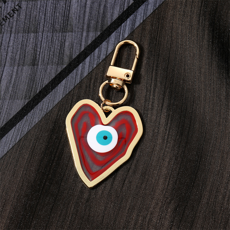 1 Piece Fashion Devil's Eye Heart Shape Arylic Alloy Bag Pendant display picture 6