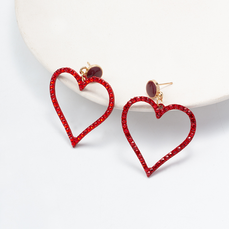 Vintage Inlaid Rhinestone Hollow Red Heart Shaped Metal Earrings display picture 2