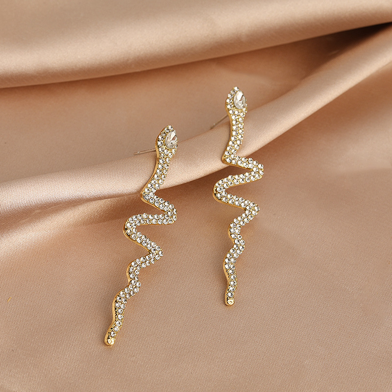 Fashion Snake-shaped Inlaid Rhinestone Stud Earrings Wholesale display picture 1