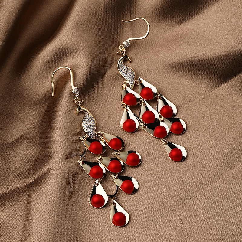 Retro Fashion Red Festive Copper Daimond Peacock Pendent Earrings display picture 2