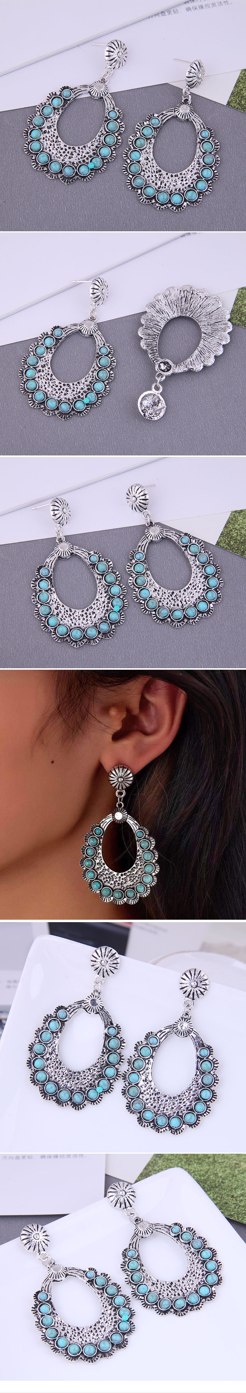 Fashion Simple Inlaid Turquoise Water Drop Exaggerated Alloy Earrings display picture 1