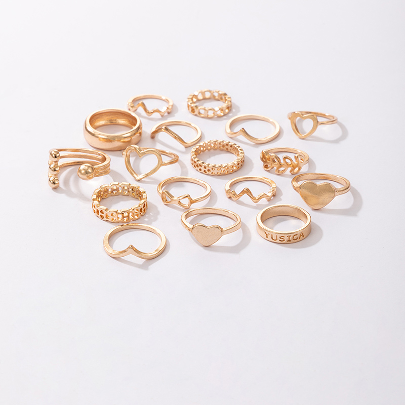 Fashion New Wavy Peach Heart Leaf Bow Open Ring Seventeen-piece Set display picture 4