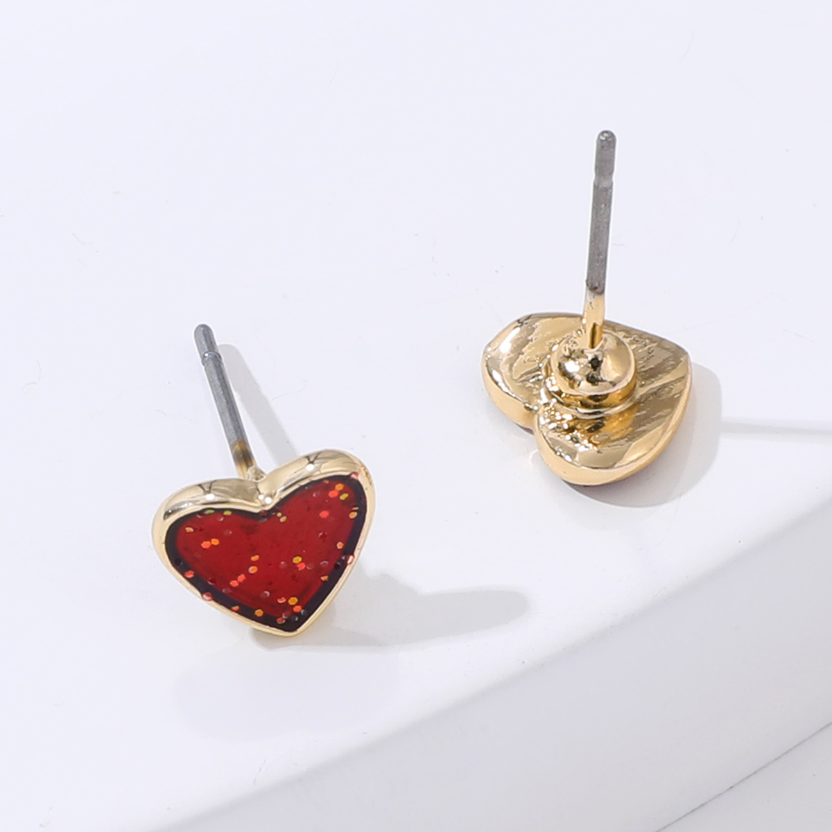 Fashion Cute Red Gold Rim Shiny Heart-shaped Metal Stud Earrings display picture 2