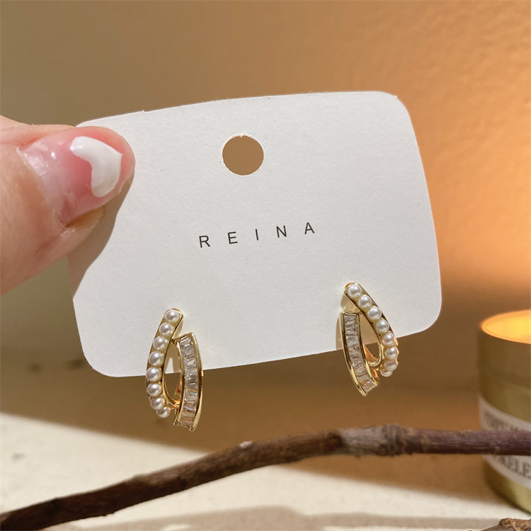 Simple Inlaid Beads Zircon Curved Alloy Stud Earrings display picture 2