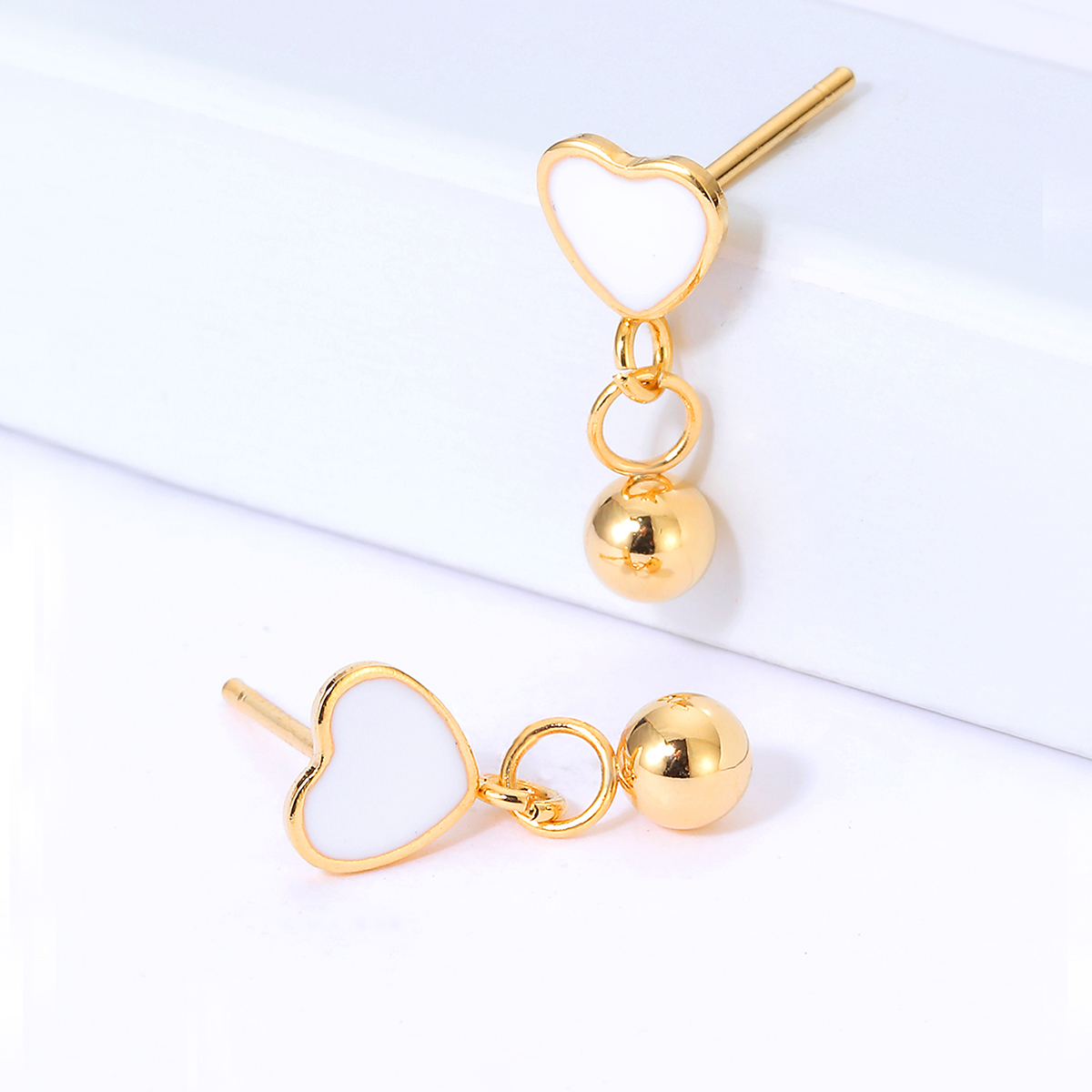 Creative Simple Stainless Steel Electroplating 18k Gold Heart Bead Pendant Earrings display picture 2