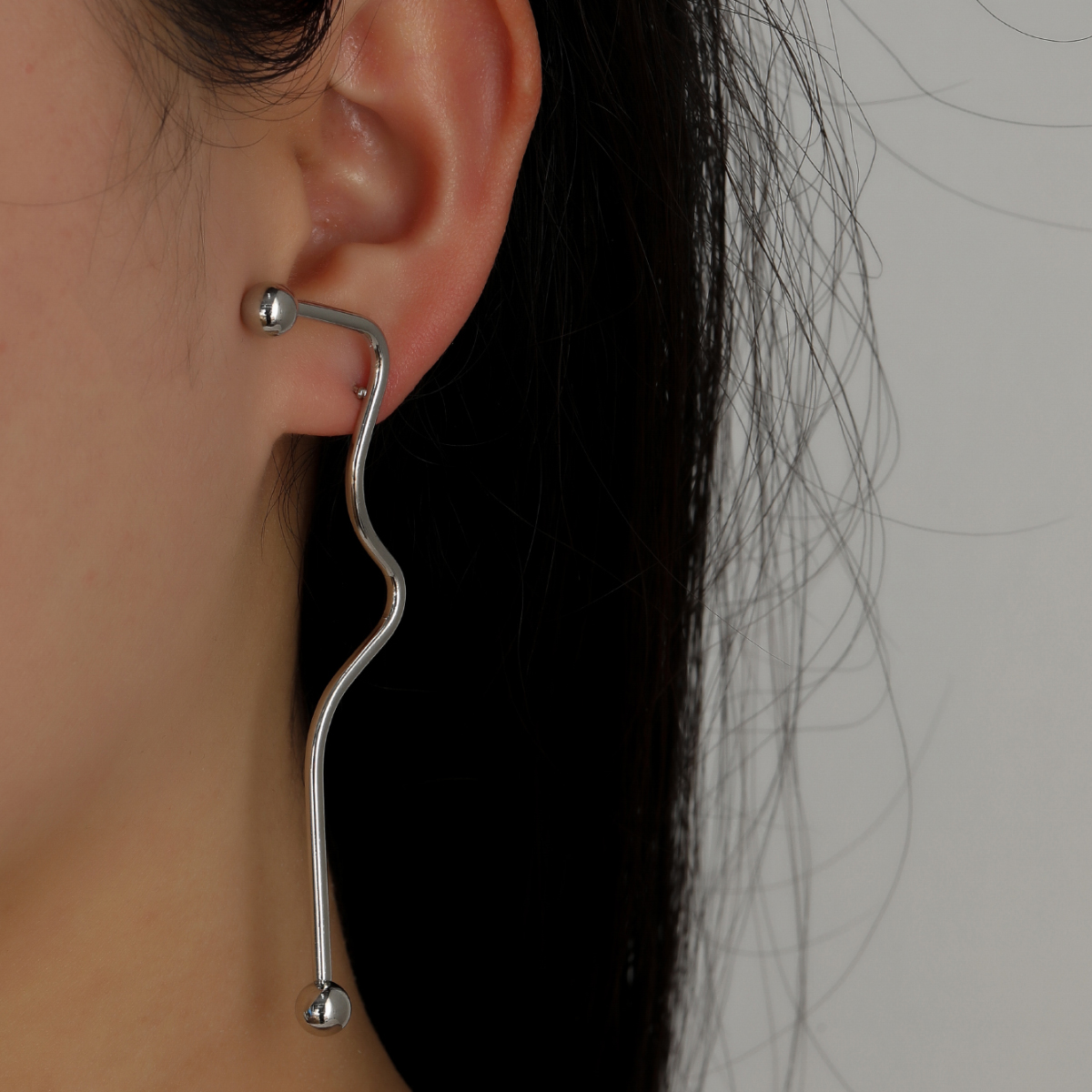 Korean Simple Asymmetrical Curve Long Stud Earrings display picture 4