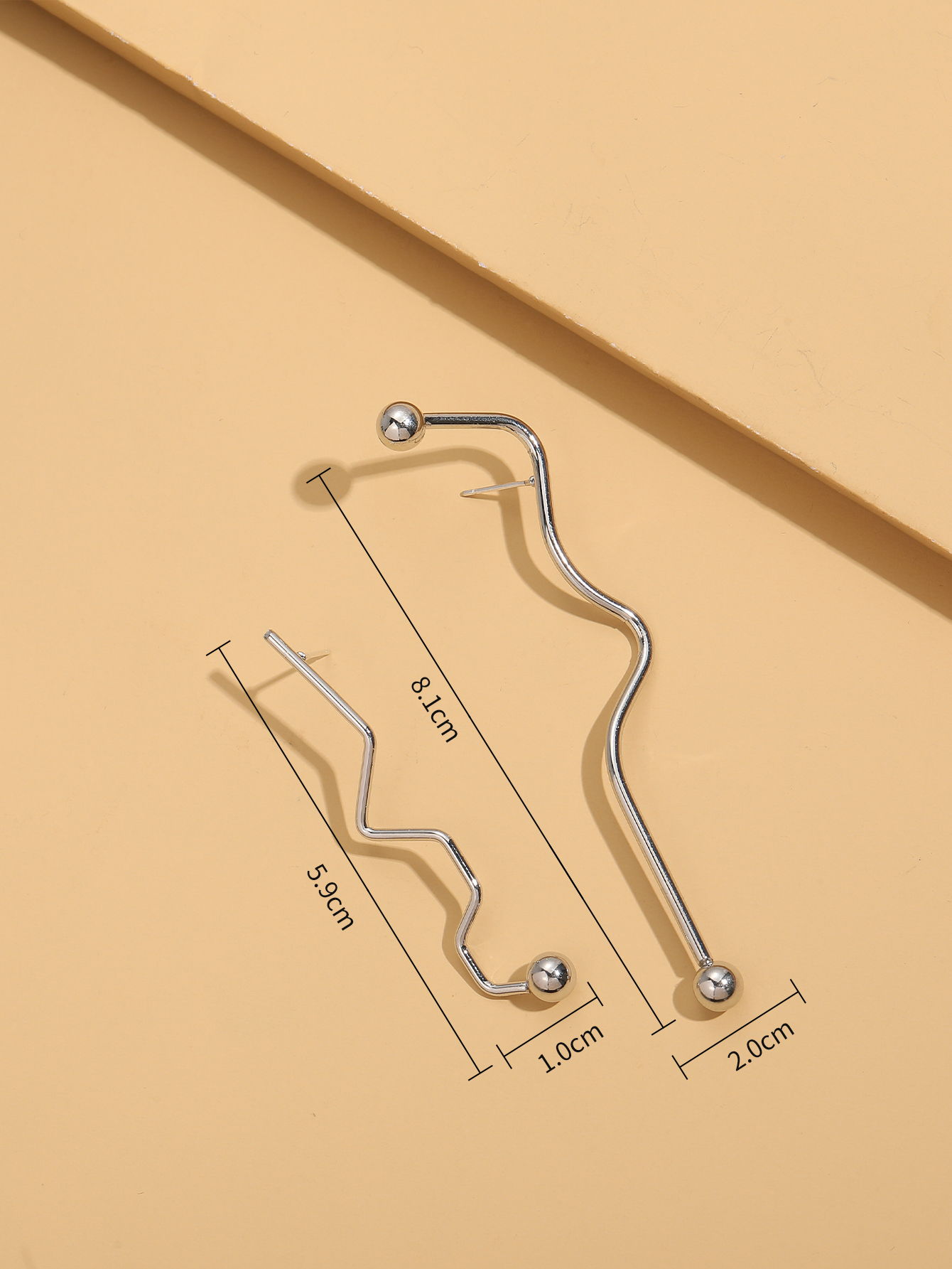 Korean Simple Asymmetrical Curve Long Stud Earrings display picture 7