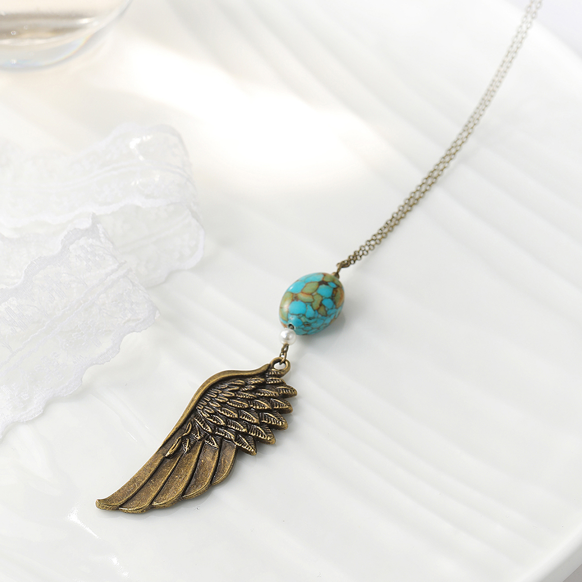 Retro Feathers Carved Eagle Wings Inlaid Turquoise Pendant Necklace display picture 6