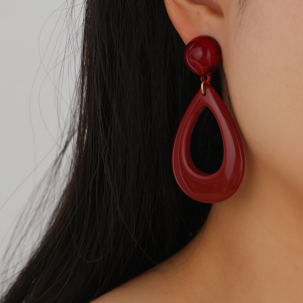 Simple Hollow Water Drop Geometric Red Pendant Earrings display picture 4