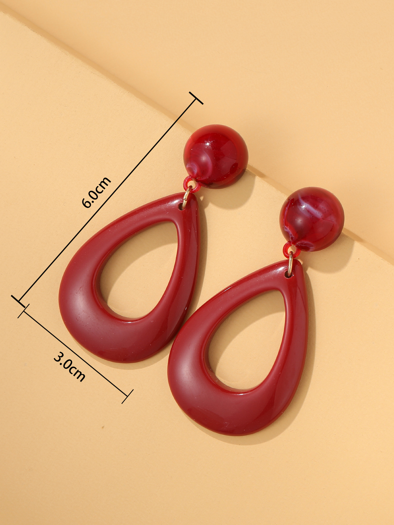 Simple Hollow Water Drop Geometric Red Pendant Earrings display picture 6