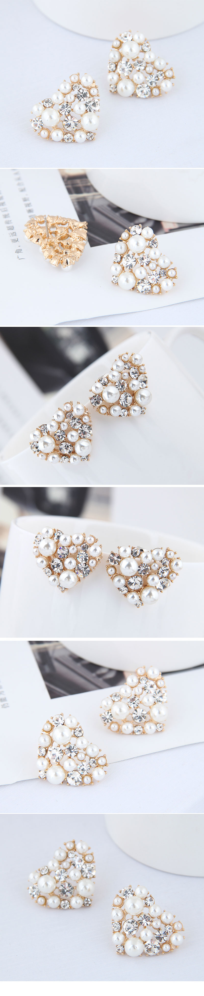 Korean Fashion Metal Sweet Bright Peach Heart Pearl Earrings display picture 1
