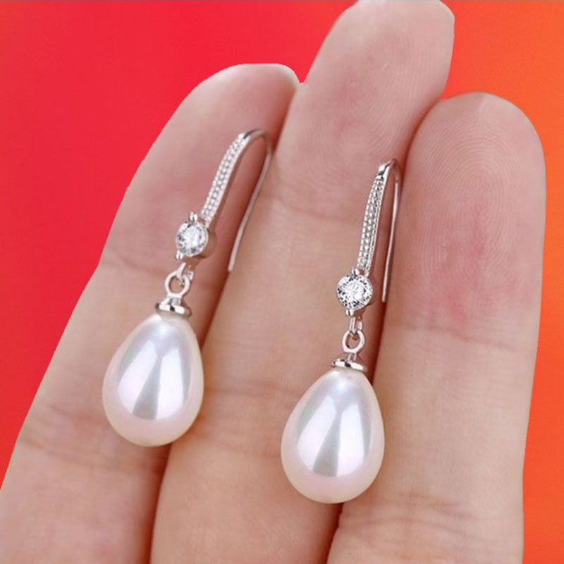 Cross-border Sold Jewelry     Oval Pearl Earrings Korean Long Red Bridal Earrings display picture 3