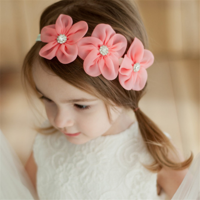 Fashion Three Small Flowers Shaped Solid Color Baby Hair Band display picture 1