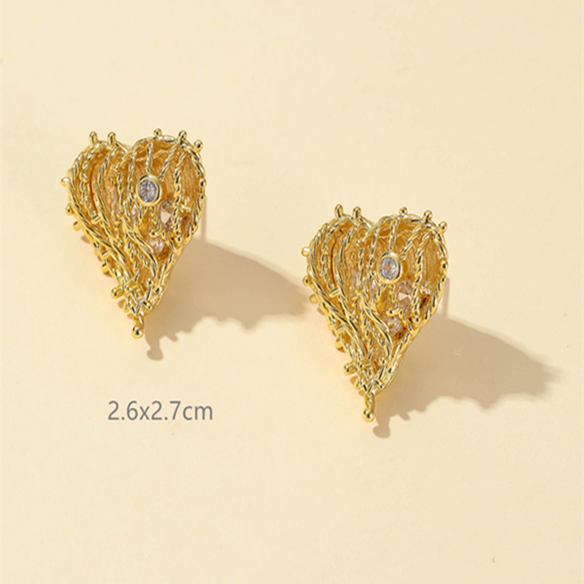 Fashionable Three-dimensional Woven Heart-shaped Stud Earrings Copper display picture 4