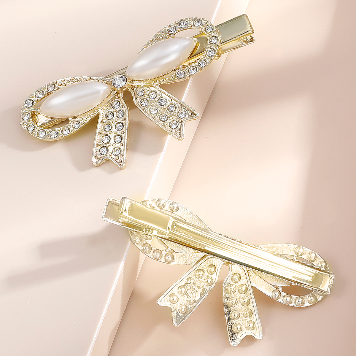 Barrettes De Perlas De 2 Piezas Corea Diamante De Imitación Borde Clip Elegante Arco Tocado De Verano display picture 2