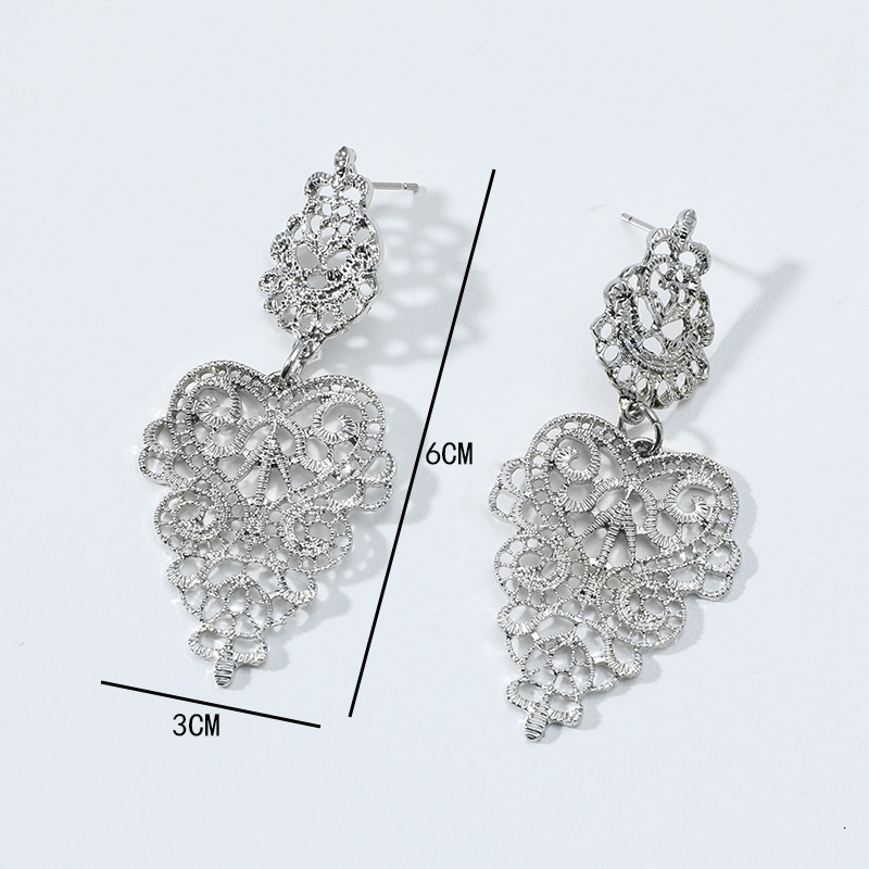 Fashion Wholesale Hollow Heart Shaped Pendant Carved Alloy Earrings display picture 4