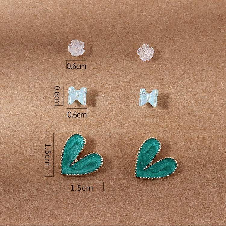 Korean Version Of The Small Fresh Minority All-match Resin Butterfly Oil Drop Peach Heart Earring Set display picture 3