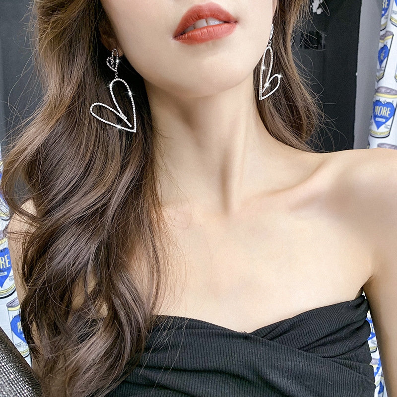 Fashion Double Hollow Heart Shape Long Pendant Earrings display picture 4