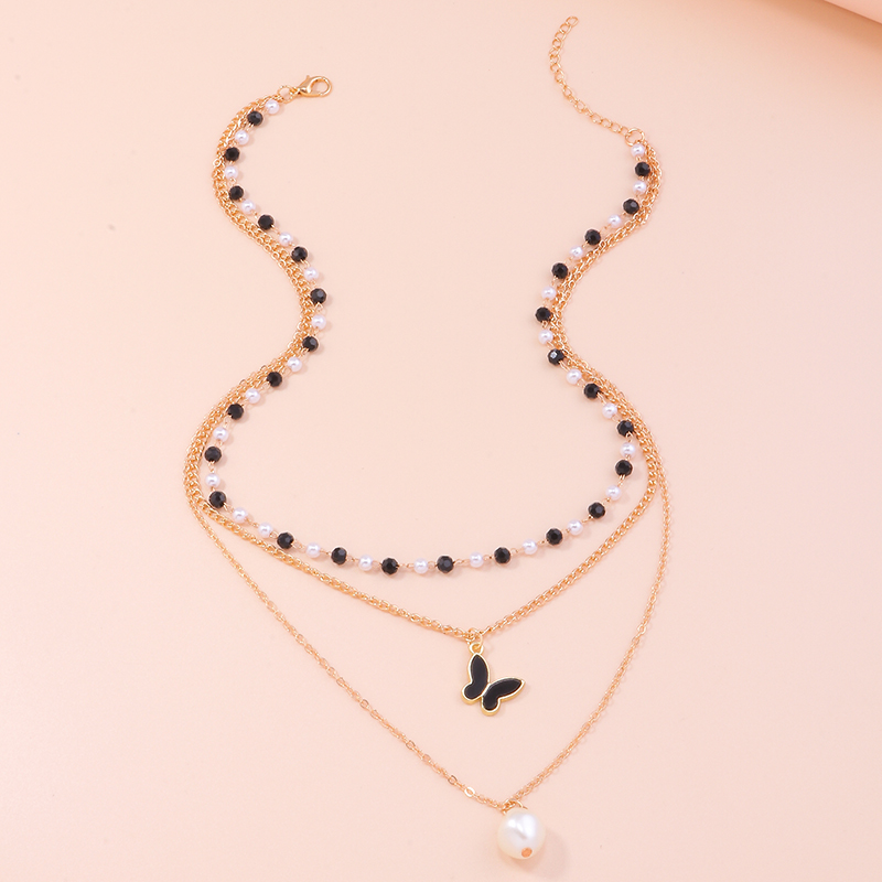 Fashion Ornament Beautiful Beaded Pearl Alloy Clavicle Chain Bow Pendant display picture 2