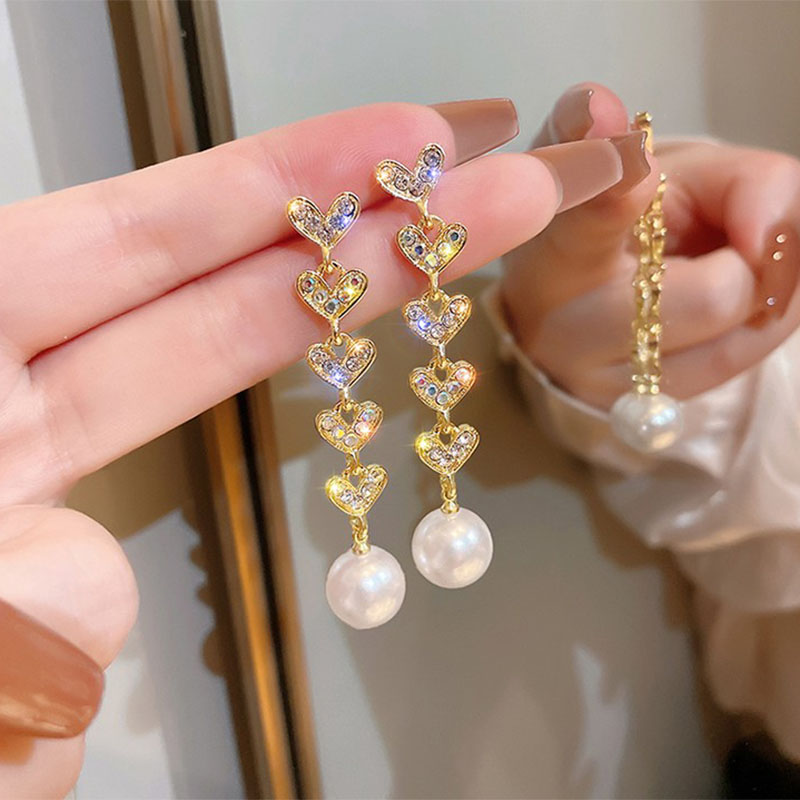 Fashion Long Heart Shaped Pearl Summer Alloy Earrings Women display picture 3
