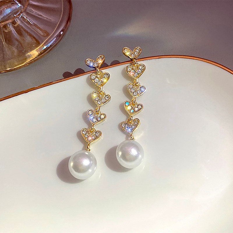 Fashion Long Heart Shaped Pearl Summer Alloy Earrings Women display picture 5