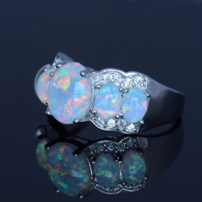 Fashion Elegant Geometric Rhinestone Inlaid Opal Alloy Ring Ornament display picture 2