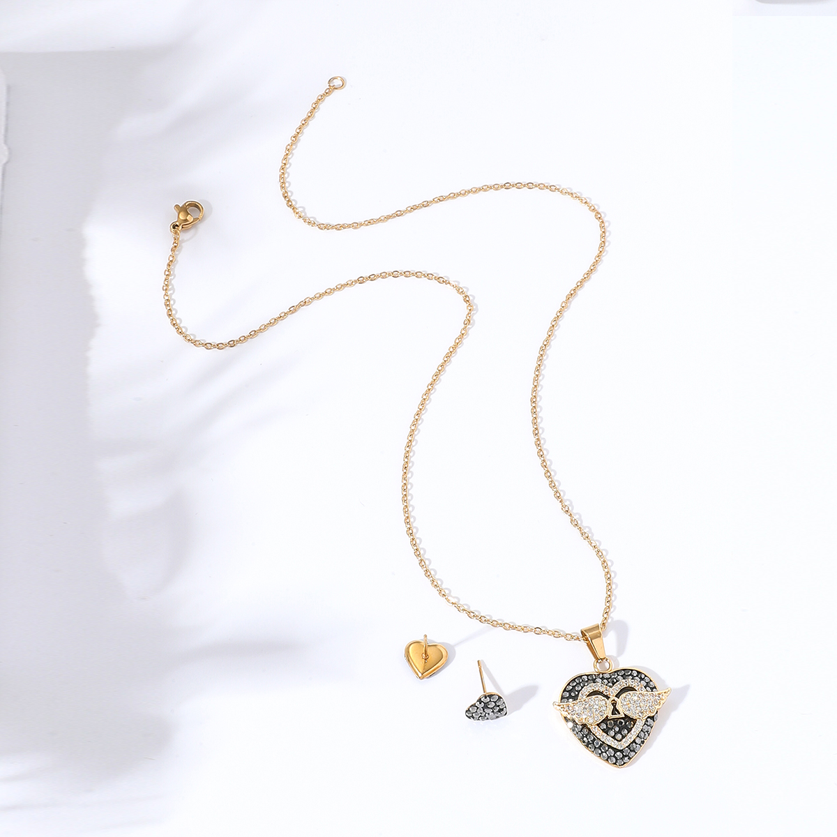 New Fashion Simple 18k Gold Plated Heart Lock Wings Copper Necklace Earrings Set display picture 2
