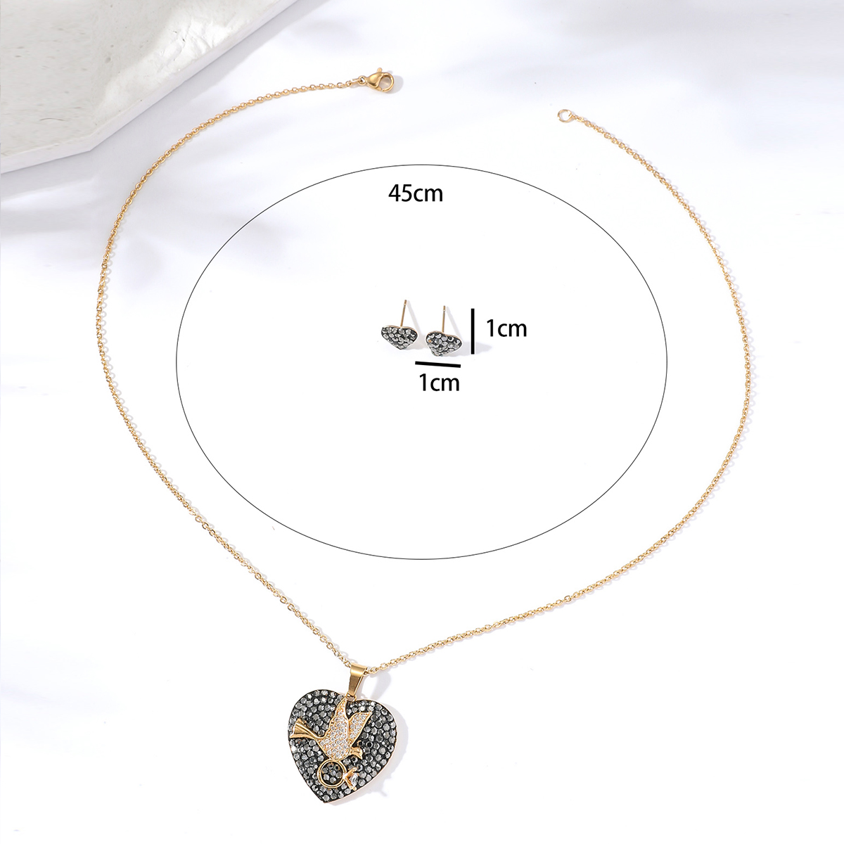 Fashion Simple Plated 18k Gold Heart-shaped Flying Pigeon Copper Necklace Earrings Set display picture 2