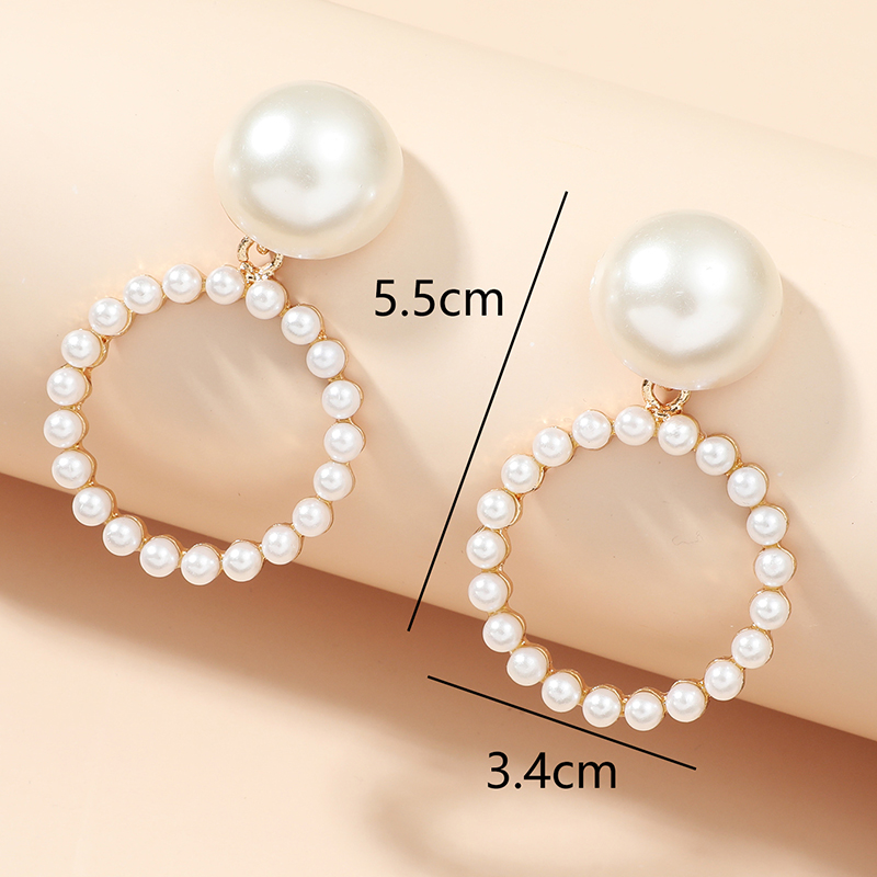 Fashion New Pearl  Women's Simple Openwork Circle Alloy Ear Studs display picture 4