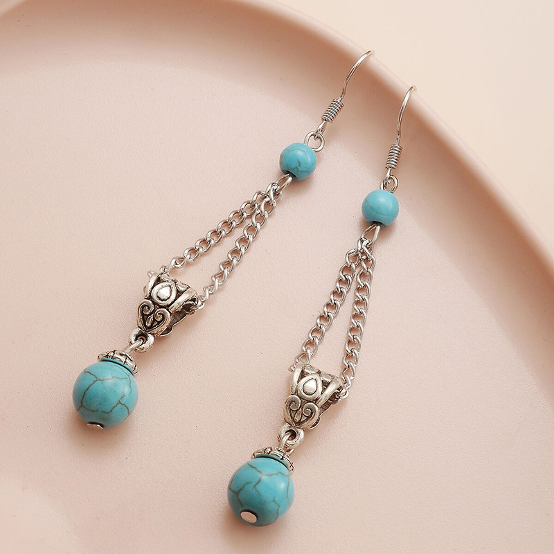 Fashion Bohemian Palace Carved Turquoise Long Resin Earrings Drop display picture 1